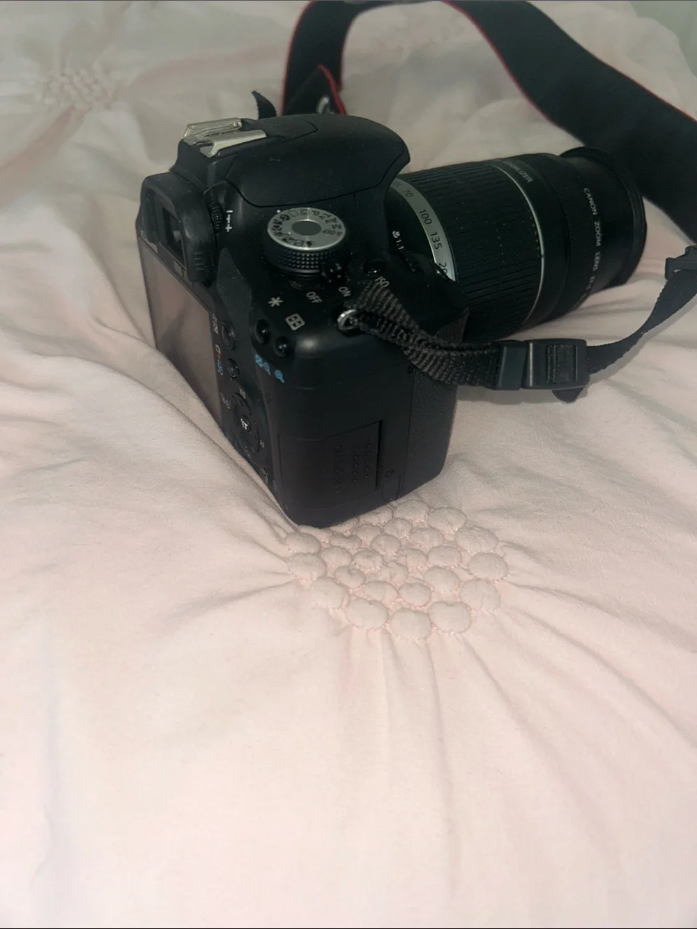 Canon Black DSLR with Zoom Lens and Branded Strap